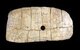 China: An oracle bone of turtle plastron pierced to be threaded on a string. Xiaotun, Anyang County, Henan Province, c. 1300 - 1050 BCE